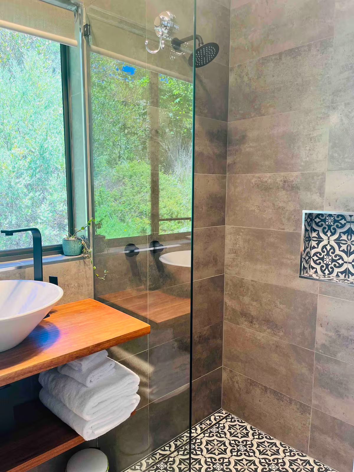 Timber vanity with bushland window